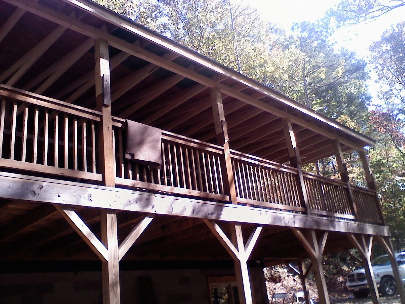 Timber framing under a new elevated porch and deck — Roof Leak Repair in Ellinger by Roofing Brothers